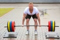 Weightlifter athlete raises the bar on the street