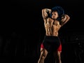 The weightlifter does the workout with burdening. He lifted a he Royalty Free Stock Photo