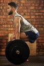 Weightlifting, workout and man with barbell for deadlift exercise, bodybuilder training and fitness. Sports, strong Royalty Free Stock Photo