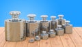 Weights Scale Calibration Set on the wooden table, 3D rendering Royalty Free Stock Photo