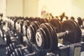 weights. Shallow depth of field, blurred foreground, focused lighting on weights for emphasis. dramatic lighting. blurred Royalty Free Stock Photo