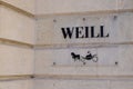 Weill sign text and logo front of wall shop refinement women fashion store