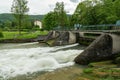 Weir on the river Schwarza in Reichenau on a cloudy day in summer Royalty Free Stock Photo