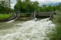 Weir on the river Schwarza in Reichenau on a cloudy day in summer Royalty Free Stock Photo