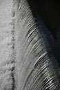 Weir with flowing water Royalty Free Stock Photo