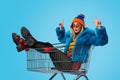 Weird female in shopping cart pointing up