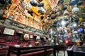Weird interior design with vintage objects in traditional persian restaurant