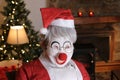 Weird looking clown dressed as Santa Claus for Christmas time Royalty Free Stock Photo