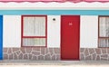 Motel with red and blue doors Royalty Free Stock Photo