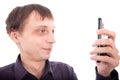 Weirdo man looking at cellphone