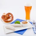 Weisswurst white sausages and sweet mustard with pretzel