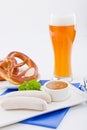 Weisswurst white sausages and sweet mustard with pretzel