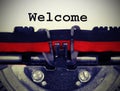 Welcom text with the typewriter with old toned effect Royalty Free Stock Photo