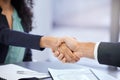 Welcome aboard. Cropped shot two unrecognizable businesspeople shaking hands during a meeting in the boardroom. Royalty Free Stock Photo