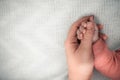 Welcome baby,Mother holding her newborn baby by little hand Royalty Free Stock Photo