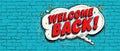 Welcome back text in comic style on blue brick wall Royalty Free Stock Photo