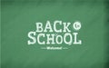 Welcome back to school. Calligraphic chalk text on a school texture board. First september banner Royalty Free Stock Photo