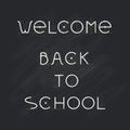 Welcome Back to school, chalk letters on black chalkboard
