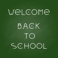 Welcome Back to school, chalk letters on green chalkboard