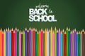 Welcome back to school green chalkboard background with colorful pencils. Realistic vector illustration Royalty Free Stock Photo