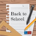 Welcome back to school with paper and stationary pencil, pen, ruler, eraser on the wooden table Royalty Free Stock Photo