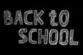 Welcome back to school sale hand drawn lettering inscription with decorative elements isolated on black background