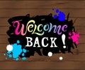 Welcome back on wooden texute background Royalty Free Stock Photo