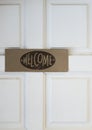 Welcome board is hanging on the wall Royalty Free Stock Photo