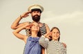 Welcome on board. small girls marine fashion. parenting discipline. sea cruise. have good swim. bearded sailor with kids