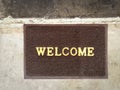 Welcome carpet gray color on old cement floor vintage background