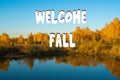 Welcome fall lettering inscription, autumn forest in the evening by the lake. Autumn forest lake scene Royalty Free Stock Photo
