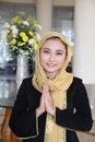 Welcome gusture from asian muslim Royalty Free Stock Photo