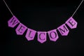Welcome home banner. Greeting letters hanging on welcoming bunti Royalty Free Stock Photo