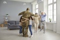 Family happy to see veteran soldier who has come back home from military service Royalty Free Stock Photo