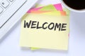 Welcome new employee colleague refugees refugee immigrants computer desk Royalty Free Stock Photo
