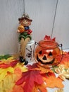 Welcome New England fall, happy scarecrow with glass pumpkin dish