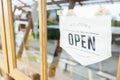 Welcome Open sign broad through the glass of window at coffee shop. shop ready to service, cafe restaurant, retail store, small