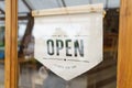 Welcome Open sign broad through the glass of window at coffee shop. shop ready to service, cafe restaurant, retail store, small Royalty Free Stock Photo