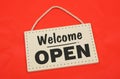 Welcome open sing sign on red background