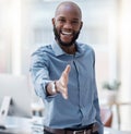 Welcome, please come in. Cropped portrait of a handsome young businessman gesturing towards the camera for a handshake