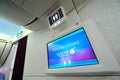 Welcome screen and lavatory signage onboard Qatar Airways Boeing 787-8 Dreamliner at Singapore Airshow