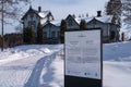 Welcome sign and information in historical Verla mill village and museum in winter. UNESCO World Heritage site in Kouvola, Finland