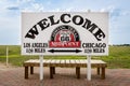 Welcome sign marking the midpoint between Chicago and Los Angeles in the historic Route 66 in Adrian , Texas, USA.