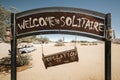 Welcome sign and rusty old vehicle in Solitaire. Solitaire is a small settlement in the Khomas Region of Central Namibia, Africa Royalty Free Stock Photo