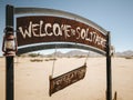 Welcome sign and rusty old vehicle in Solitaire. Solitaire is a small settlement in the Khomas Region of Central Namibia, Africa Royalty Free Stock Photo