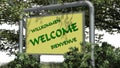 WELCOME - Sign with text between trees in the park