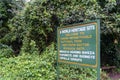 Welcome sign to Bwindi Impenetrable National Park, Southern Sector at Rushaga Gate, noting the gorilla families found on treks Royalty Free Stock Photo