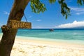 Welcome sign to paradise beach and sea on island Royalty Free Stock Photo