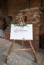 Welcome sign to wedding, wooden frame natural wood with flowers Royalty Free Stock Photo