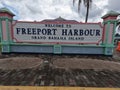 A welcome sign tourists to the Freeport Harbor on Grand Bahama Island